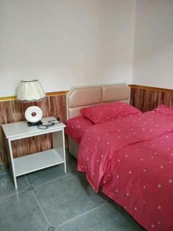 Imagen de la habitación del Xinyuge Guesthouse. Foto 5