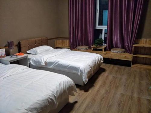 Imagen de la habitación del Xinyuge Guesthouse. Foto 7