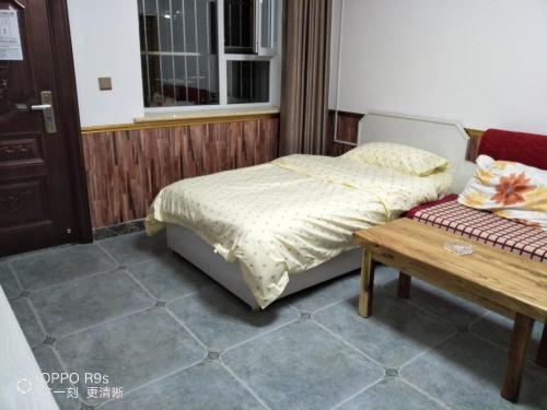 Imagen de la habitación del Xinyuge Guesthouse. Foto 9
