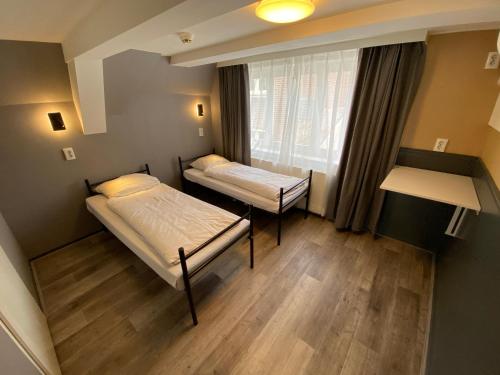 Imagen de la habitación del Xplore Hostel Amsterdam. Foto 12