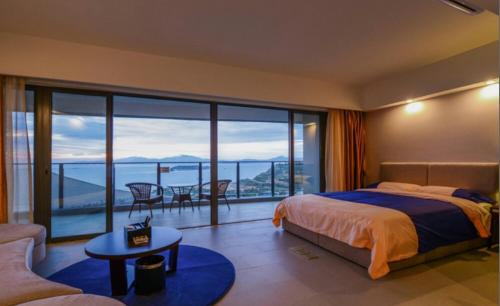 Imagen de la habitación del Xunliao Bay Invincible Seaview Hotel Apartment. Foto 9