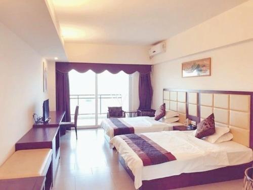 Imagen de la habitación del Xunliao Bay Sea Park Holiday Hotel. Foto 9