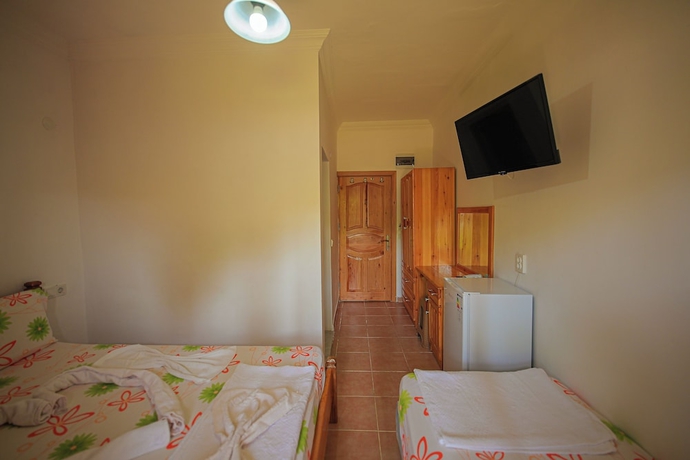 Imagen de la habitación del YAVUZ MOTEL ADRASAN. Foto 7