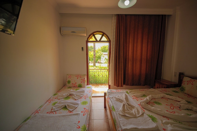 Imagen de la habitación del YAVUZ MOTEL ADRASAN. Foto 8
