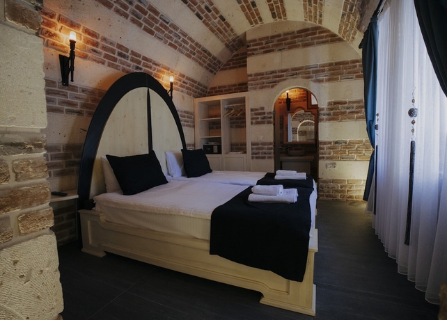 Imagen de la habitación del YILKI CAVE SUİTES. Foto 6
