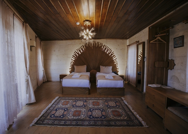 Imagen de la habitación del YILKI CAVE SUİTES. Foto 15