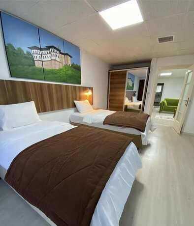 Imagen de la habitación del Yaman Suite Hotel. Foto 19