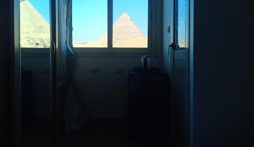 Imagen de la habitación del Yamour Pyramids View. Foto 19