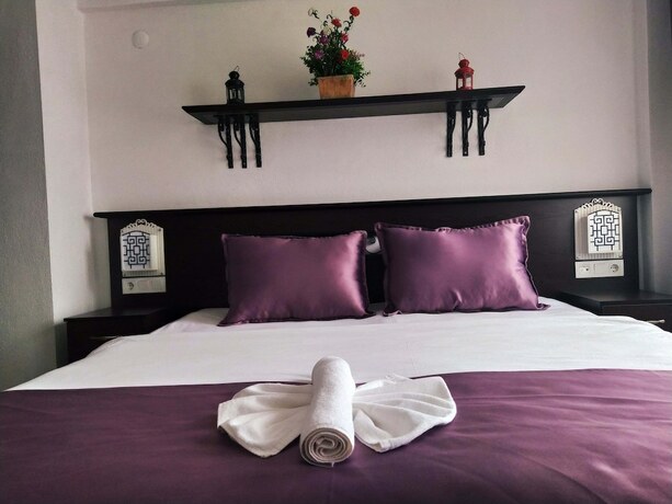 Imagen de la habitación del Yeni Bademli Konukevi. Foto 18