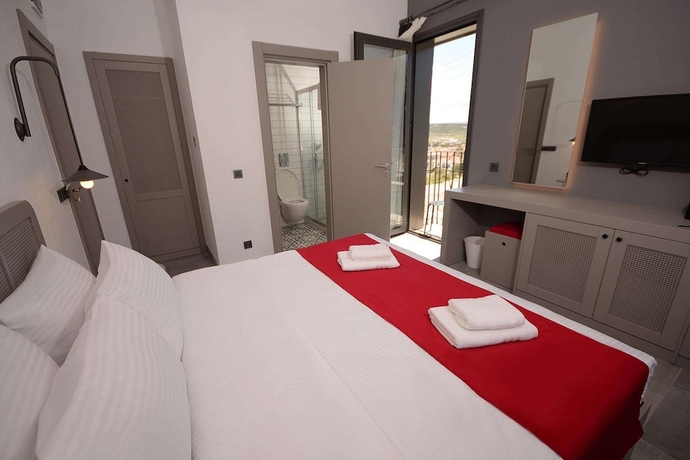 Imagen de la habitación del Yerli Otel Alacati. Foto 5