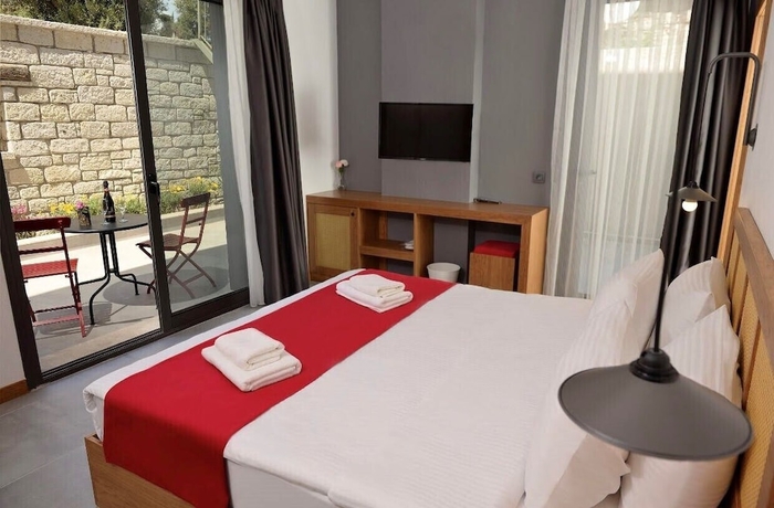 Imagen de la habitación del Yerli Otel Alacati. Foto 10