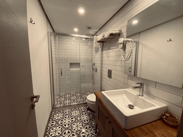 Imagen de la habitación del Yerli Otel Alacati. Foto 14