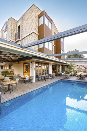 Imagen de la piscina del Yerli Otel Alacati. Foto 18