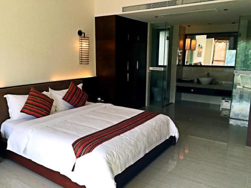 Imagen general del Yidai Apartment Wanning Huarun Shimei Bay. Foto 1