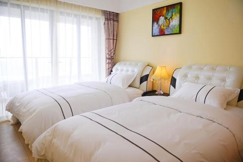 Imagen de la habitación del Yishang International Apartment Yangjiang Hailing. Foto 6