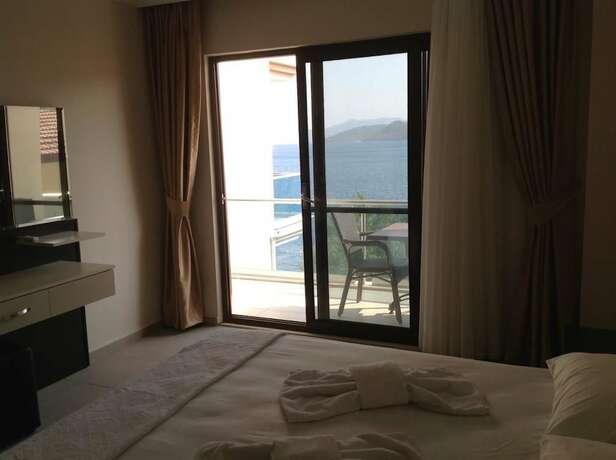 Imagen de la habitación del Yılmaz Kaptan Otel. Foto 17