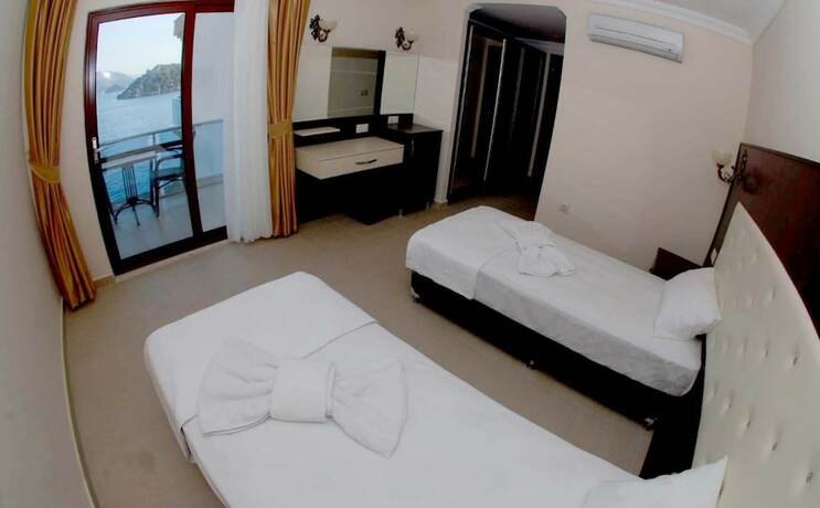 Imagen de la habitación del Yılmaz Kaptan Otel. Foto 20