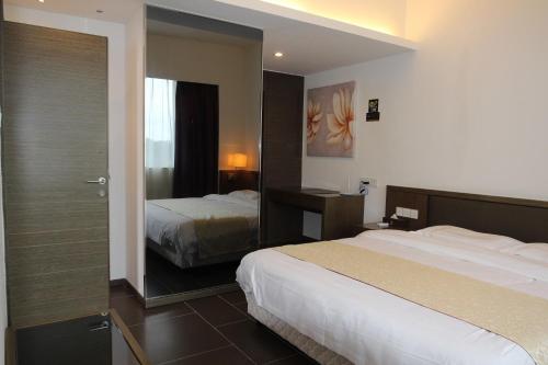 Imagen de la habitación del You Cheng Shang Pin Apartment. Foto 8