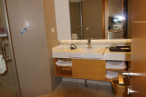 Imagen de la habitación del You Cheng Shang Pin Apartment. Foto 9