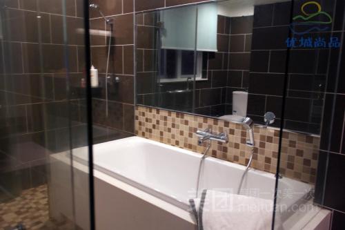 Imagen de la habitación del You Cheng Shang Pin Apartment. Foto 10