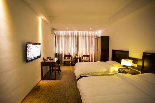 Imagen de la habitación del Yu Jiu Wan Garden Hotel. Foto 9