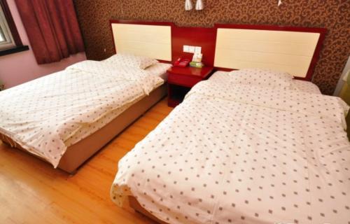 Imagen de la habitación del Yucheng Dayu Business Hotel. Foto 8