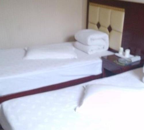 Imagen de la habitación del Yulin Jinhong Hotel. Foto 5