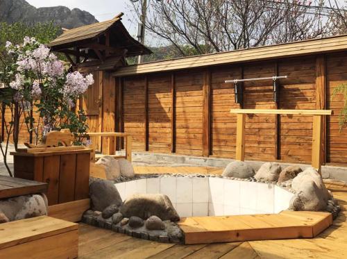 Imagen de la habitación del Yun Ju Courtyard Apartment. Foto 7