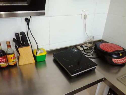 Imagen de la habitación del Yun Ju Courtyard Apartment. Foto 8