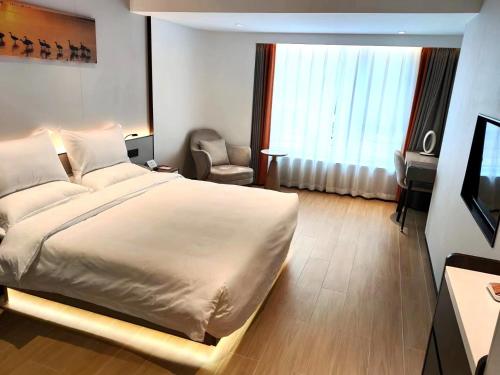 Imagen de la habitación del Yun Qi Hotel. Foto 19