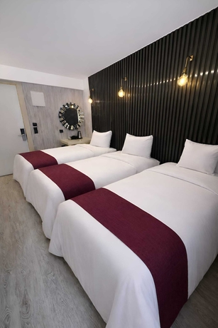Imagen de la habitación del ZEBRA OTEL BUCA. Foto 3