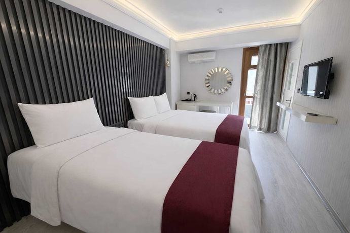 Imagen de la habitación del ZEBRA OTEL BUCA. Foto 5