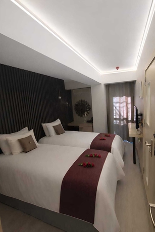 Imagen de la habitación del ZEBRA OTEL BUCA. Foto 7