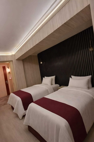 Imagen de la habitación del ZEBRA OTEL BUCA. Foto 8
