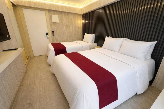 Imagen de la habitación del ZEBRA OTEL BUCA. Foto 10