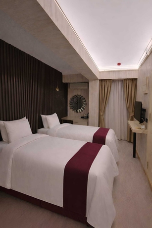 Imagen de la habitación del ZEBRA OTEL BUCA. Foto 12