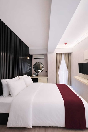 Imagen de la habitación del ZEBRA OTEL BUCA. Foto 14