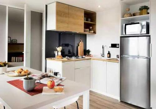 Imagen de la habitación del ZEcamping 4 &eacute;toiles chiens accept&eacute;s tennis piscine chauff&eacute;e. Foto 19