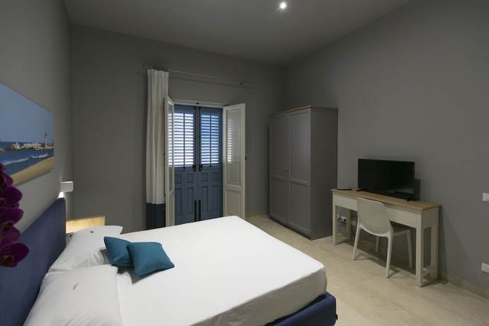 Imagen de la habitación del ZIBIBBO SUITES and ROOMS - Aparthotel in Centro Storico a Trapani. Foto 16