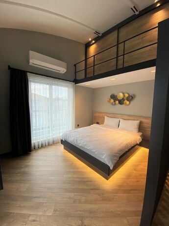 Imagen de la habitación del Z-Suites. Foto 19