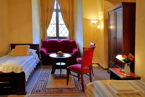 Imagen de la habitación del Zamek Cerveny Hradek. Foto 9