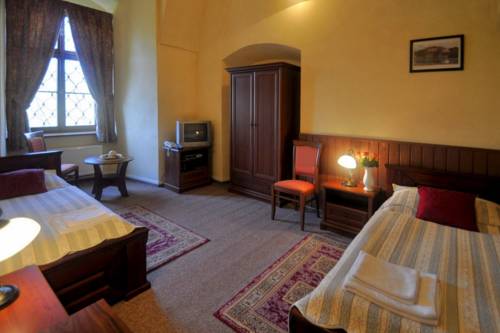 Imagen de la habitación del Zamek Cerveny Hradek. Foto 10