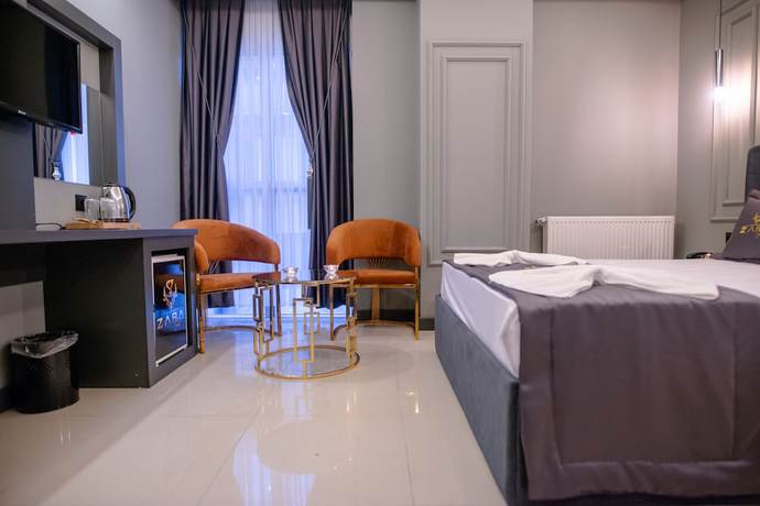 Imagen de la habitación del Zara Suit. Foto 16