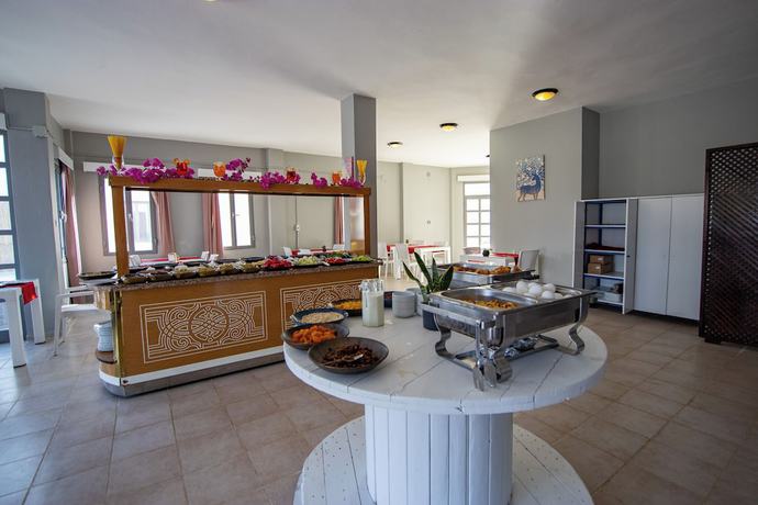 Imagen del bar/restaurante del Zemda Hotel Gumusluk. Foto 3