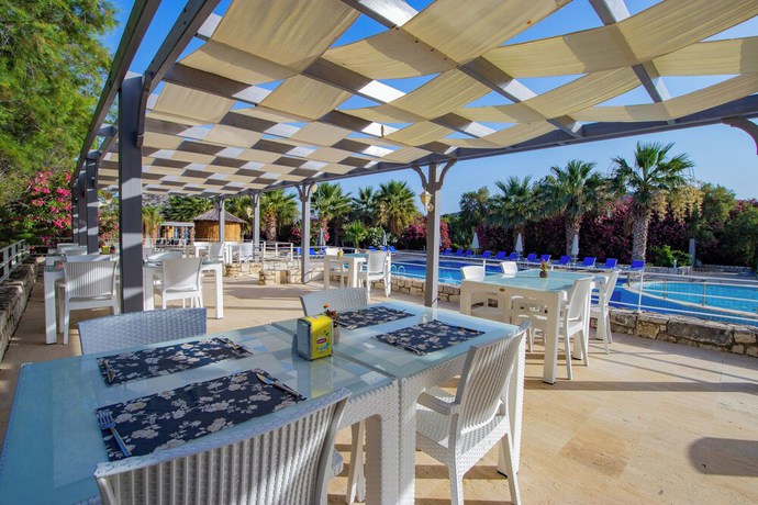 Imagen del bar/restaurante del Zemda Hotel Gumusluk. Foto 6