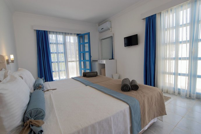 Imagen de la habitación del Zemda Hotel Gumusluk. Foto 10