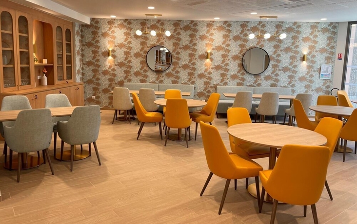 Imagen del bar/restaurante del Zenao Appart\'h&ocirc;tels Ch&acirc;lons-en-Champagne. Foto 4
