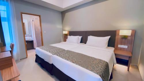 Imagen de la habitación del Zenith Suites Cameron. Foto 12