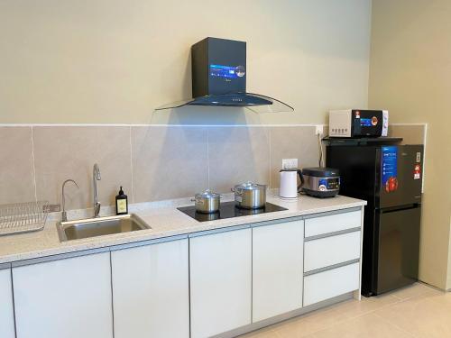 Imagen de la habitación del Zenith Suites Cameron. Foto 17