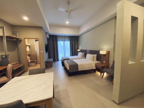 Imagen de la habitación del Zenith Suites Cameron. Foto 19